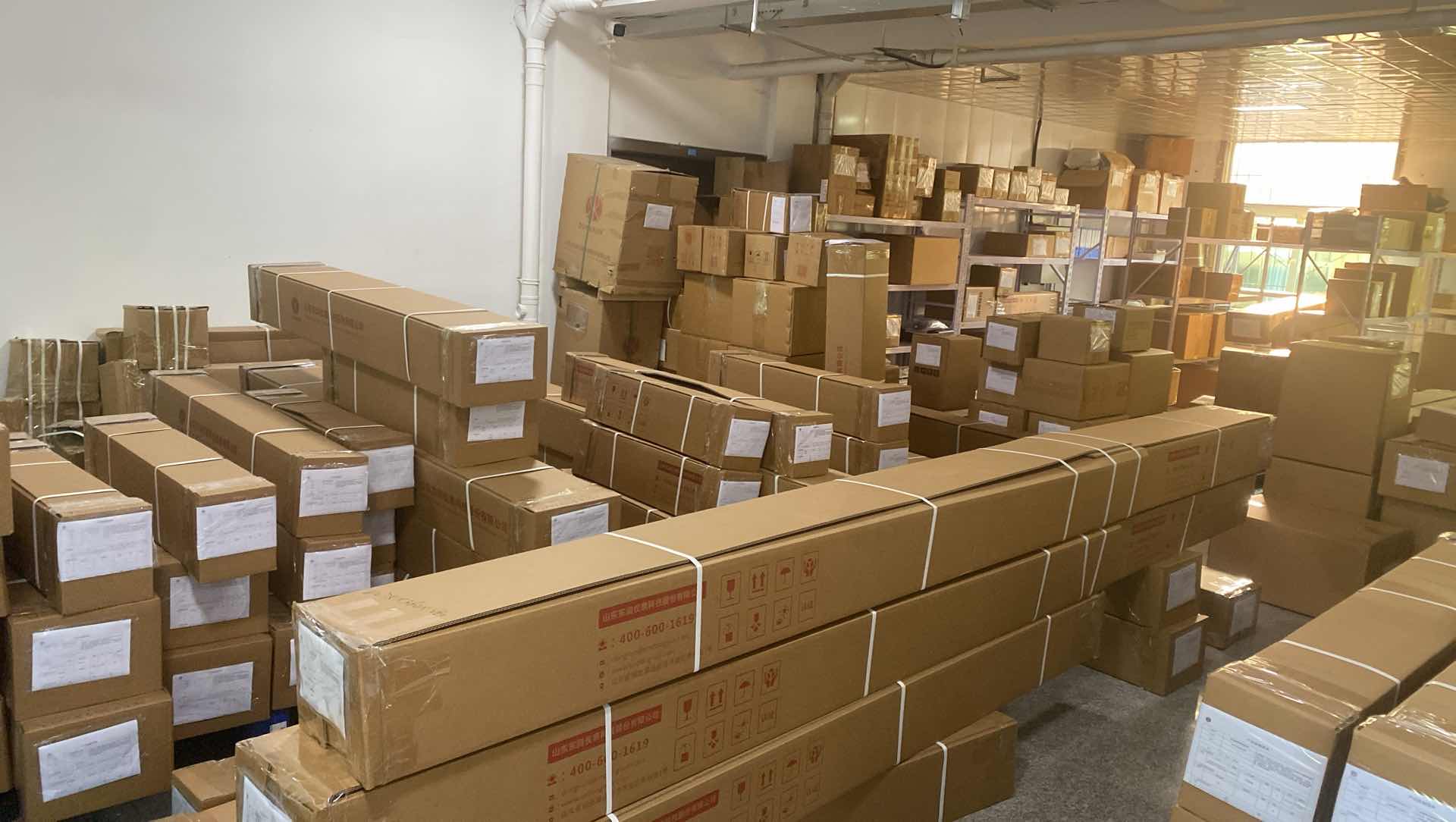 Warehouse stacked with packed level gauges and water analysis instruments for export
