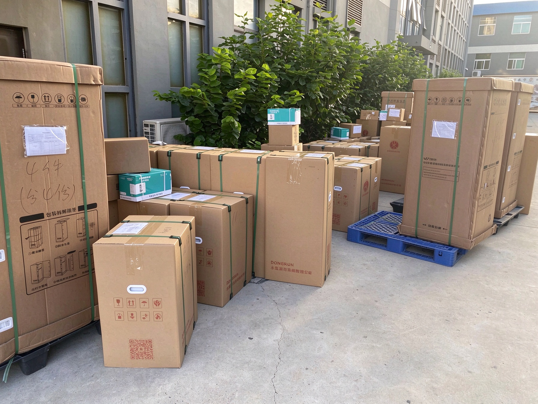 Export cartons of industrial level gauges and water analyzers loaded onto truck